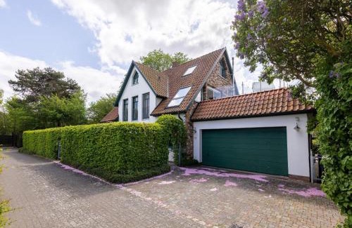 Zudar Maison | Ferienhaus-Ruegenbrise-mit-Seeblick-direkt-am-Wasser