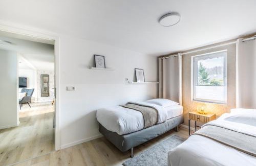 Joachimsthal Maison | Ferienhaus Seeliebe 70 QM I 2 Schlafzimmer I 5 min zum See I überdachte Terrasse I nahe Werbellinsee