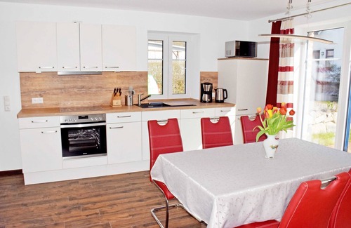 Gross Zicker Appartement | Ferienhaus zum Boddenstrand mit Kamin