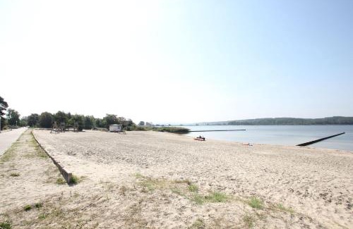 Lietzow Appartement | Ferienresidenz Zwei Bodden FeWo2-8 - Balkon, Sauna, Kamin
