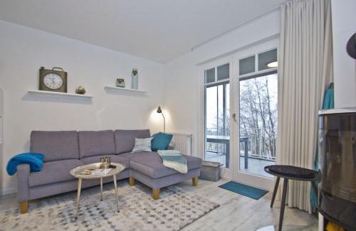Lietzow Appartement | Ferienresidenz Zwei Bodden FeWo2-8 - Balkon, Sauna, Kamin