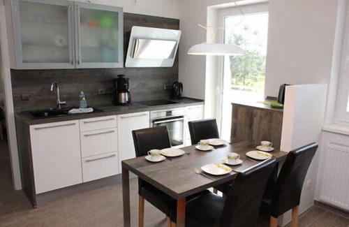 Ostseebad Dierhagen Appartement | Ferienwohnung mit Balkon in Einem Reetdachgedecktem Strandhaus