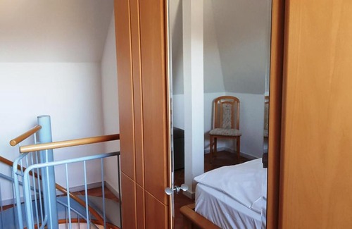 Neuensien Appartement | Ferienwohnung 15 im Fischerhaus mit Balkon