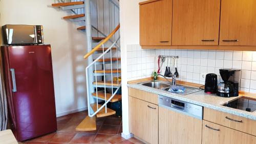 Neuensien Appartement | Ferienwohnung 15 im Fischerhaus mit Balkon