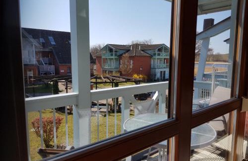 Neuensien Station Balnéaire | Ferienwohnung 4 im Haus am See mit Wintergarten und Terrasse