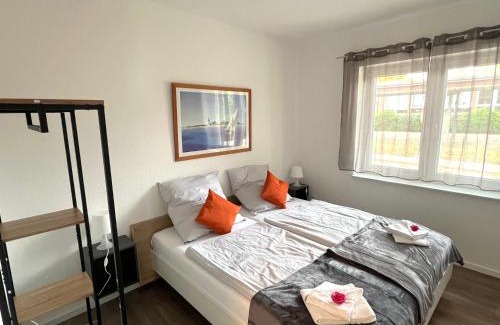 Papenburg Appartement | Ferienwohnung "Calypso" Papenburg Ebenerdig Terrasse Einbauküche Neubau 84 qm Free Wifi 2 Schlafzimmer