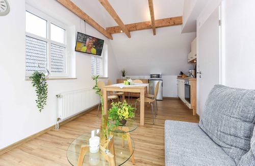 Neuharlingersiel Appartement | Ferienwohnung Flut - Meeresleuchten in Neuharlingersiel