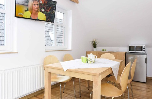 Neuharlingersiel Appartement | Ferienwohnung Flut - Meeresleuchten in Neuharlingersiel