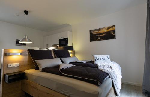 Schwemlingen Appartement | Ferienwohnung Dorfbrunnen