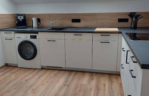 Langdorf Appartement | Ferienwohnung Gartenblick mit Südbalkon