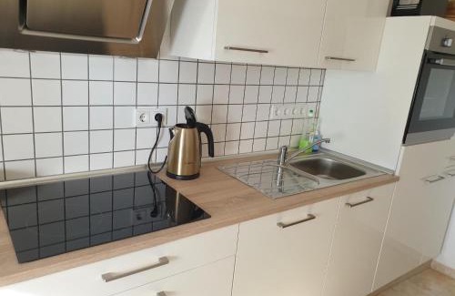 Plutscheid Appartement | Ferienwohnung Hügelhaus
