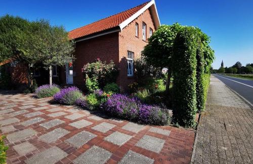 Rhauderfehn Appartement | Ferienwohnung Heckmann, 95138