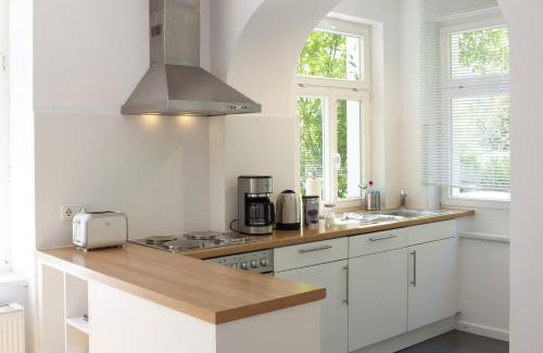 Bad Wildungen Appartement | Ferienwohnung Hufelandstern bis 7 Personen - mit E-Ladesäule!