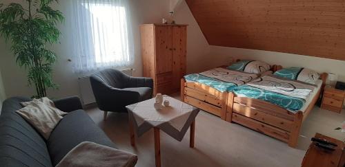 Gnies Appartement | Ferienwohnung Leopold-Risch