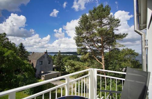 Lietzow Appartement | Ferienwohnung mit Balkon und Meerblick - Ferienresidenz Zwei Bodden FeWo 1-4
