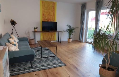 Wasserlos Appartement | Ferienwohnung mit Terrasse am Rosengarten