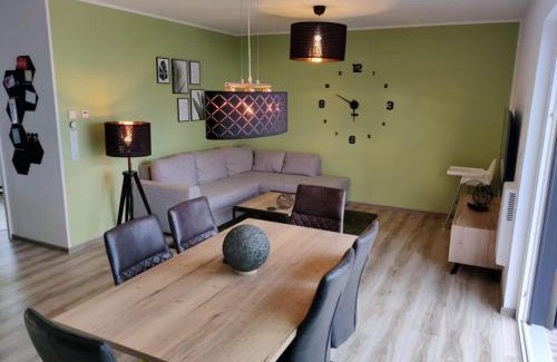 Barssel Appartement | Ferienwohnung Sonnenstrahl am Harkebrügger See mit Sauna