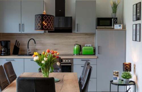 Barssel Appartement | Ferienwohnung Sonnenstrahl am Harkebrügger See mit Sauna