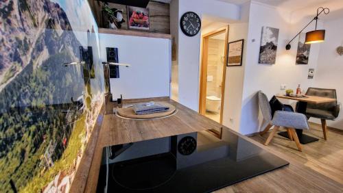 Ried Appartement | Ferienwohnungen Wolf- Studio Zimmer mit Bergblick