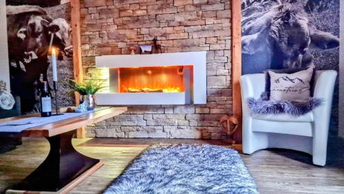 Ried Appartement | Ferienwohnungen Wolf - Wohnung" Kienberg" mit Bergblick