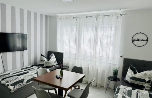 Langen Appartement | FeWo BEE61 * Langen EXKLUSIV für 4 Personen *Vollausstattung mit Küche* inklusive TERRASSE