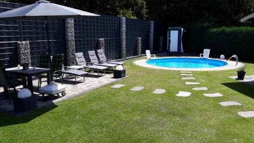 Mahren Appartement | FeWo Meyer mit privatem Pool & Gartensauna
