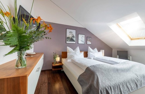 Freyung Appartement | Appartement Purple | Appartement 5 étoiles avec terrasse sur le toit pour les plus hauts standards