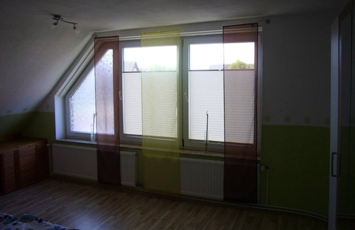 Neuharlingersiel Appartement | FEWO2 pour les familles, également avec un chien, vue sur la digue et à quelques pas de la plage