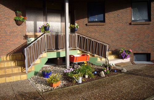 Neuharlingersiel Appartement | FEWO2 pour les familles, également avec un chien, vue sur la digue et à quelques pas de la plage