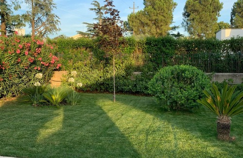 Castellana Grotte Villa | Villa finement meublé avec jardin, pelouse et véranda tout sur le confort et la détente