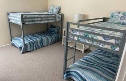 South End Copropriété | First floor three bedroom, two full bath unit two blocks from the beach