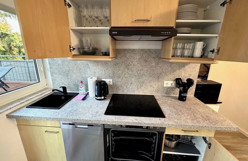 Kaltenweide Appartement | Flughafennähe, 24h-self-checkin, große Dachterrasse, WLAN, Smart-TV, Klima