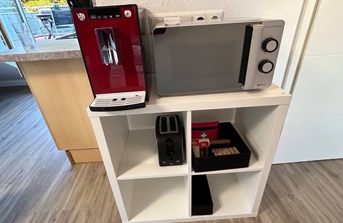 Kaltenweide Appartement | Flughafennähe, 24h-self-checkin, große Dachterrasse, WLAN, Smart-TV, Klima