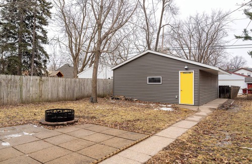 Midway Maison | Follow the Yellow Front Door to an inviting home close to everything.