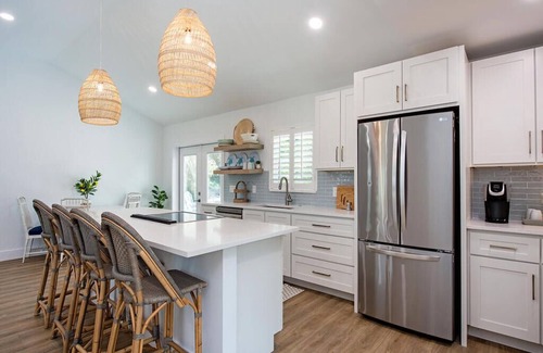 Isles of Capri Maison | Fully remodeled water front home with boat dock
