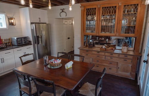 Cleveland Park Maison | Fully renovated 1800s Carriage House seamlessly blends history w/modern luxury.