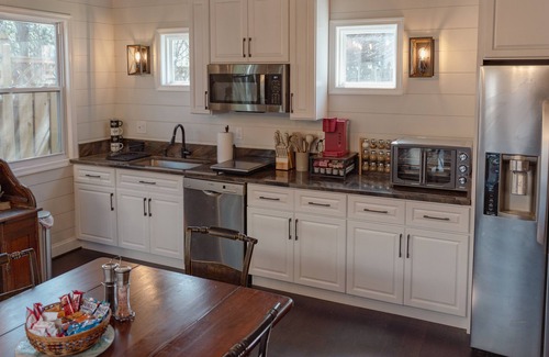 Cleveland Park Maison | Fully renovated 1800s Carriage House seamlessly blends history w/modern luxury.