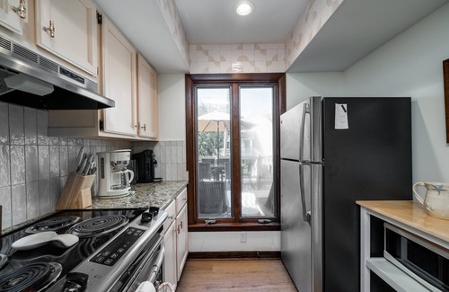 Spinnaker Beachhouses Villa | Fully Renovated! Beautiful 2BR/2BA Villa! Walk to Beach & Club! Amenity Cards! Dog Friendly!