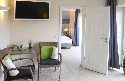 Rerik Appartement | FZ 9-11 / 2-pièces-cuisine sans cuisine (48m², 4 pers.) - lit + vélo | B & B | Bike Pension Ostseeland Rerik