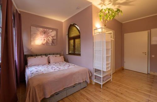 Monsheim Maison | Gästehaus Villa Fliedner - Das Kutscherhaus
