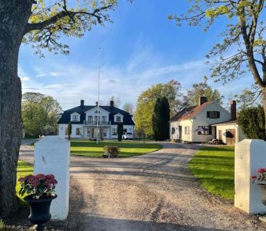 Vikingstad Maison | Gårdsflygel med egen trädgård