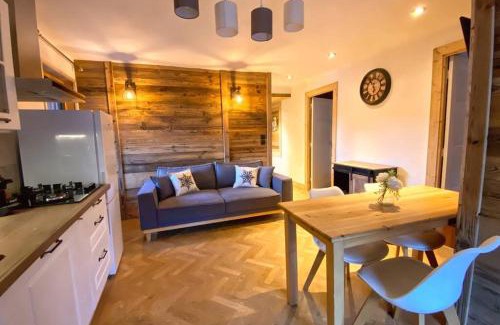 Les Sagnieres Appartement | Gîte avec jacuzzi privatif