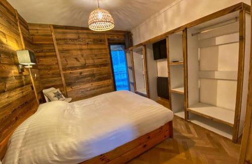 Les Sagnieres Appartement | Gîte avec jacuzzi privatif