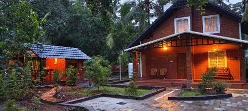 Thalassery Chalet De Ski | Gangadharam Tiny House 2BHK AC