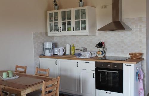 Kroepelin Maison | Gemütliches Appartement in Brusow mit Garten