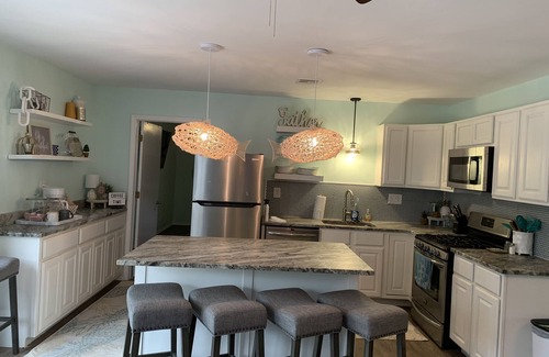 Pettit Maison | Gem on Lake Tenkiller with open floor plan and game room for kids/adults.