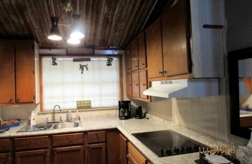 Claxton Maison | Georgia's Coziest Riverside Retreat: Cabin Adventure in Claxton