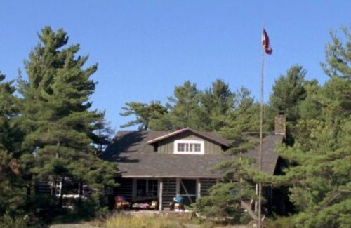 The Archipelago Cottage | Georgian Bay Private island, unique authentic log cabin