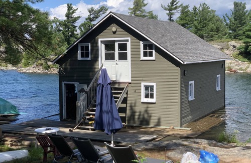 The Archipelago Cottage | Georgian Bay Private island, unique authentic log cabin