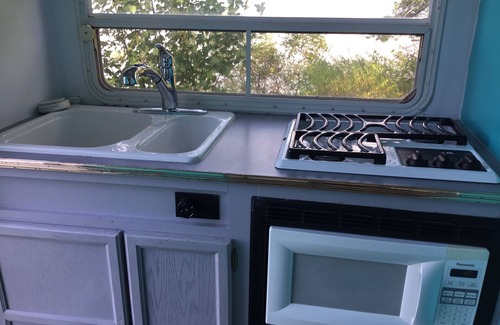 Michigan Maison | Get lulled to sleep by Lake Superior in Vintage camper 5 steps from the water